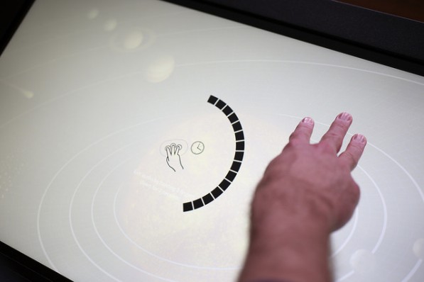 User enables accessibility layer with 3-finger gesture